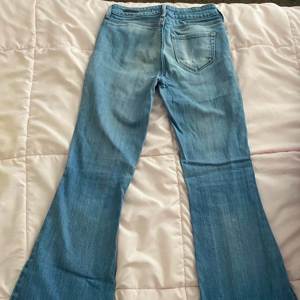 Women’s Ripped Flared Jeans - Picture 2 of 4